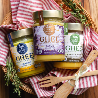 A 4th & Heart ghee jar styled with cooking props.